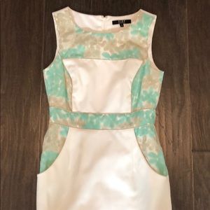 Super flattering white/gold/mint green dress